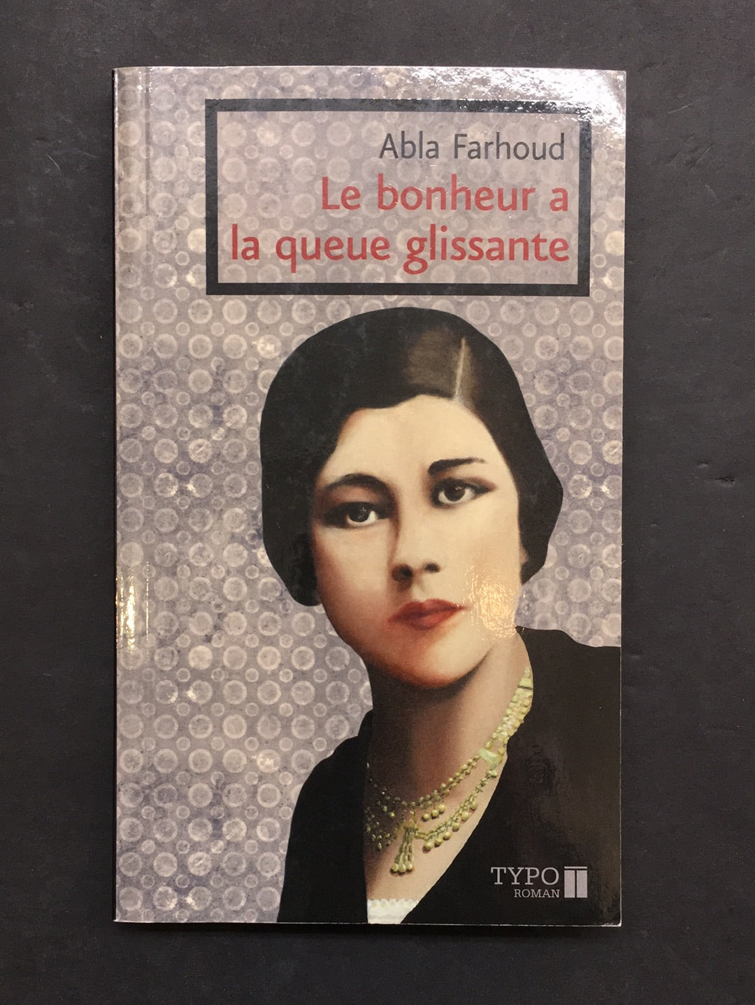 LE BONHEUR A LA QUEUE GLISSANTE