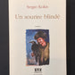 UN SOURIRE BLINDÉ