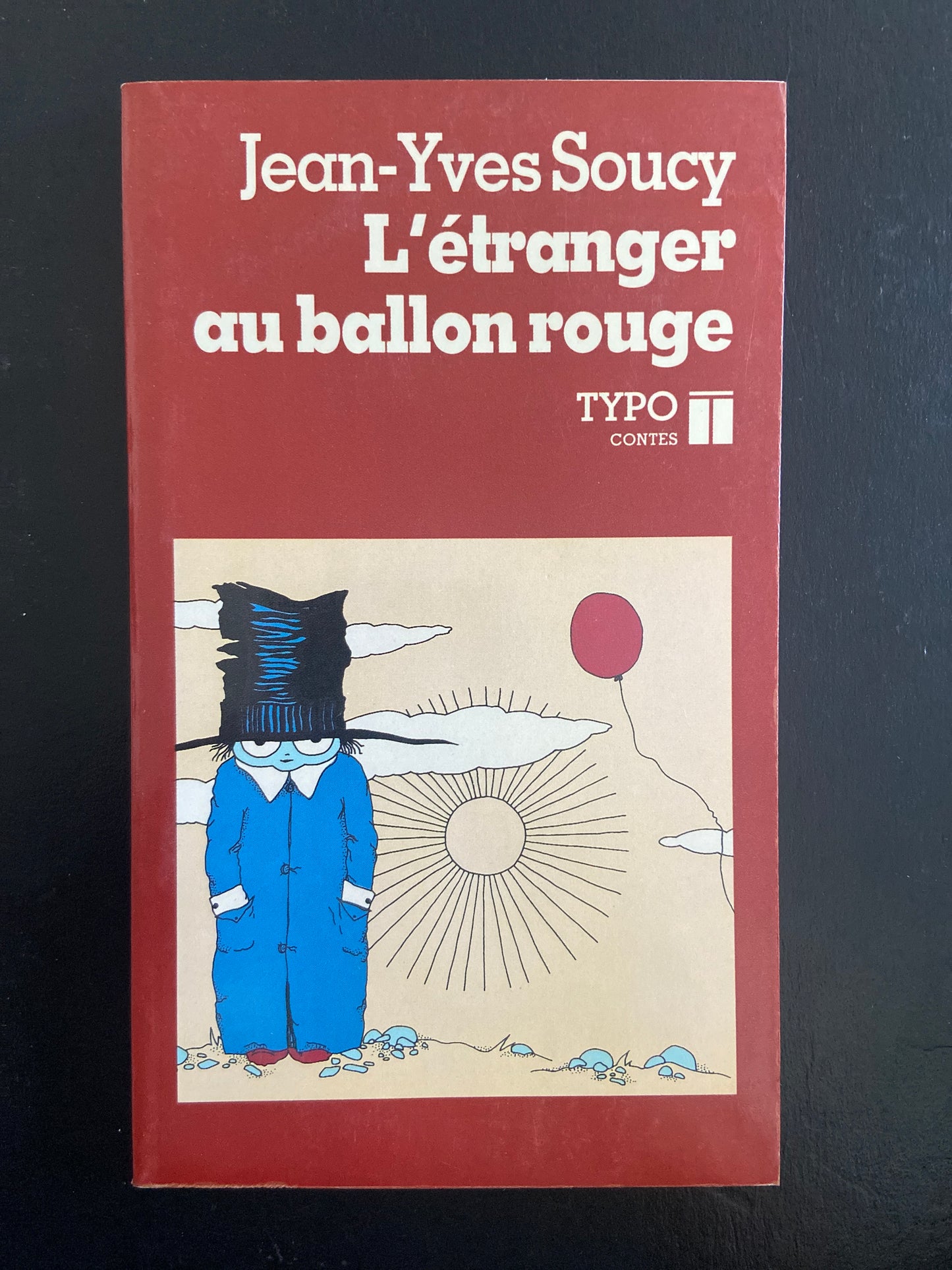 L'ÉTRANGER AU BALLON ROUGE