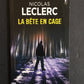 LA BÊTE EN CAGE